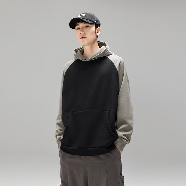 Herren Kapuzenpullover im Colourblock-Design mit Raglanärmeln, Kängurutasche und geripptem Saum Drune