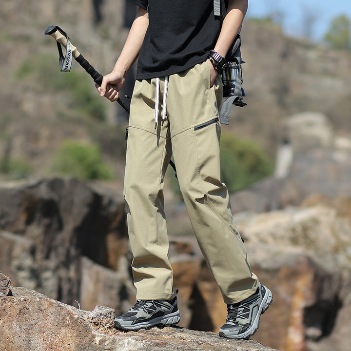Herren Technische Trekkinghose mit Reißverschlusstaschen und Kordelbund Drune