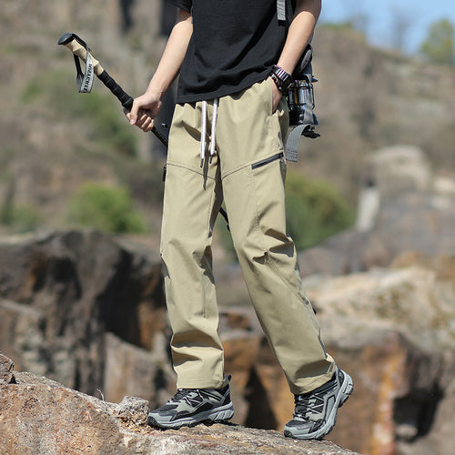Herren Technische Trekkinghose mit Reißverschlusstaschen und Kordelbund Drune