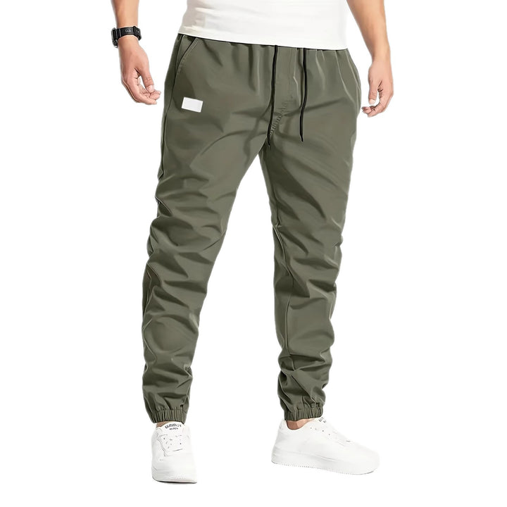 Herren Technische Jogginghose im Tapered‑Utility‑Stil mit elastischem Bund & Knöchelbündchen Drune