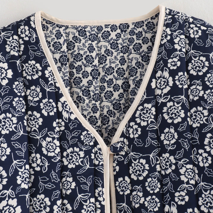Damen gesteppte Jacke mit floralem Allover, V-Ausschnitt, Kontrastpaspel und aufgesetzten Taschen Drune