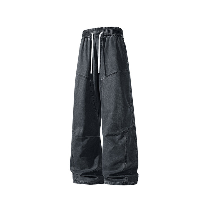 Herren weite Baggy-Cargohose aus gewaschenem Canvas mit Elastikbund und dekorativen Nahtpaneelen Drune