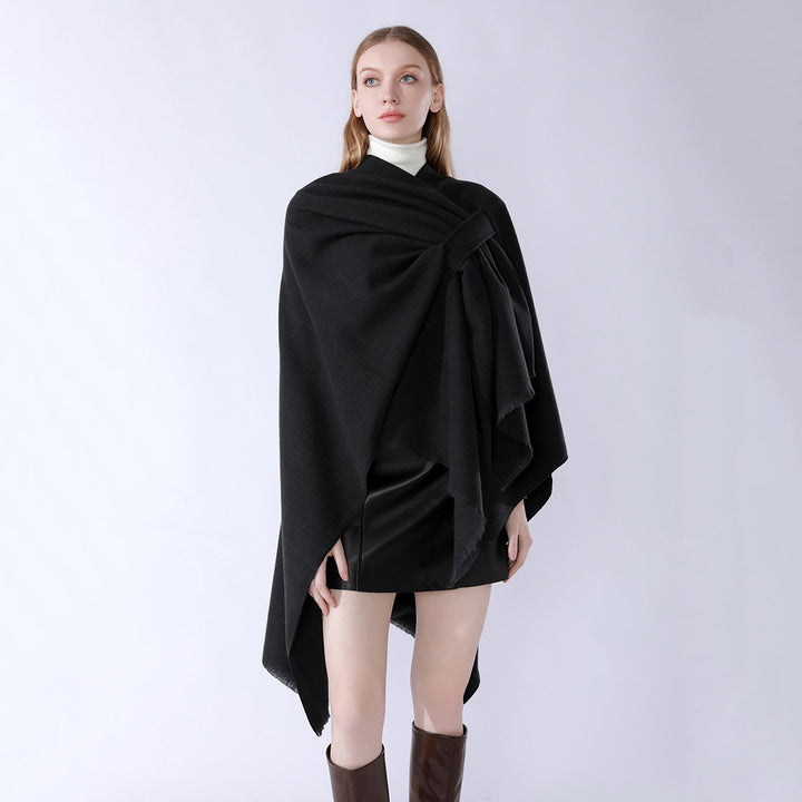 Damen Strickponcho mit geometrischem Blockmuster und Fransen Drune