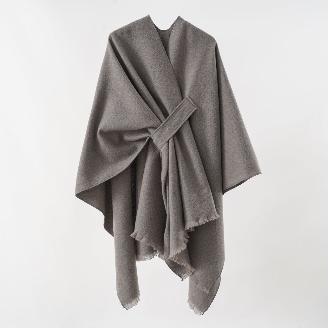 Damen Strickponcho mit geometrischem Blockmuster und Fransen Drune