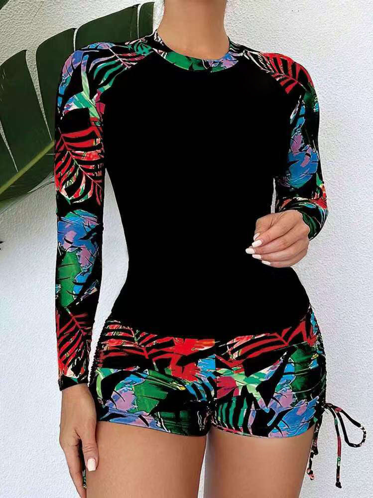 Damen Sport-Rashguard mit kurzen Hosen und farbenfrohem Muster Drune