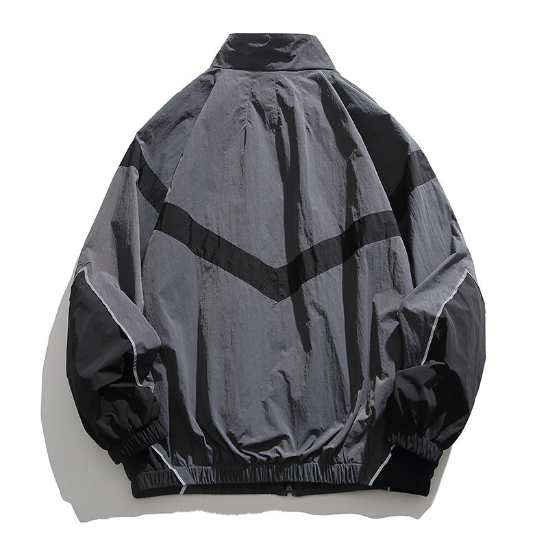 [Unisex] Oversize technische Wind- und Regenjacke mit Stehkragen, reflektierenden Paspeln und elastischem Saum Drune