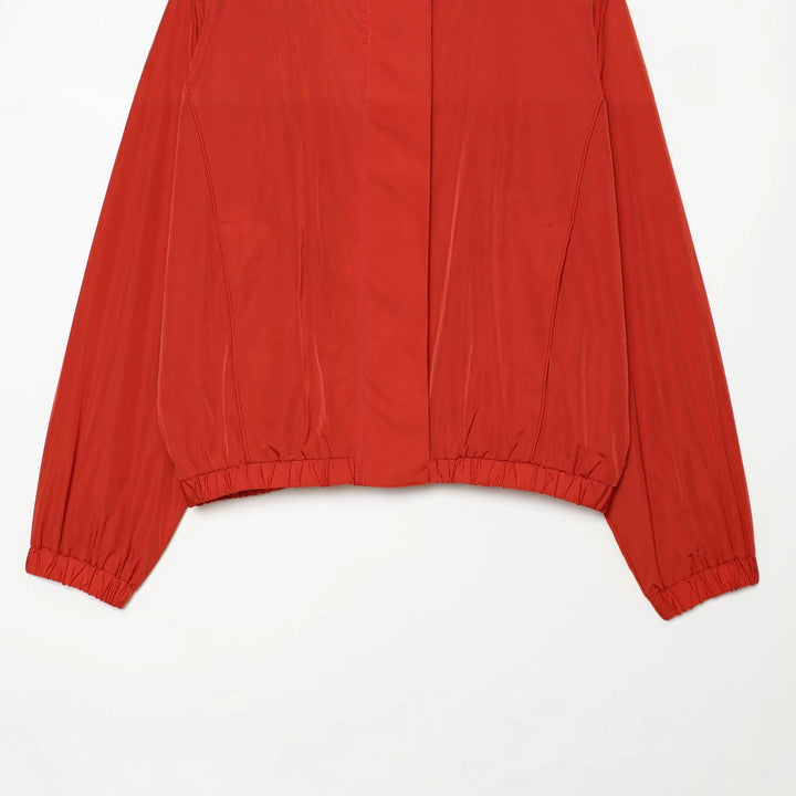 Damen Leichter Technical Windbreaker‑Blouson mit hohem Stehkragen, verdecktem Reißverschluss und elastischem Saum Drune
