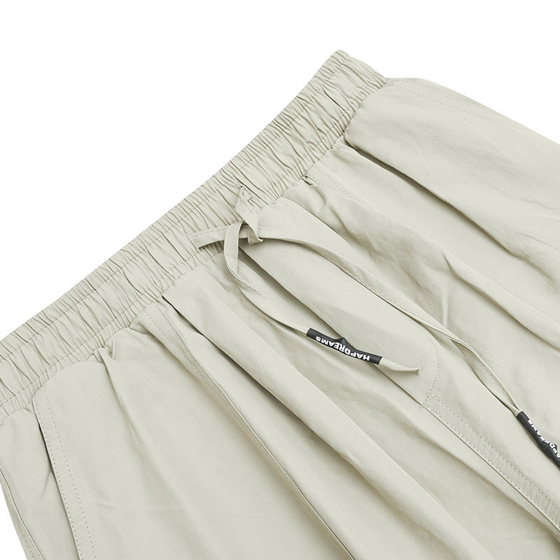 Unisex Weite Harem-Hose mit Kordelzugbund, elastischen Beinabschlüssen und Oversize-Silhouette Drune