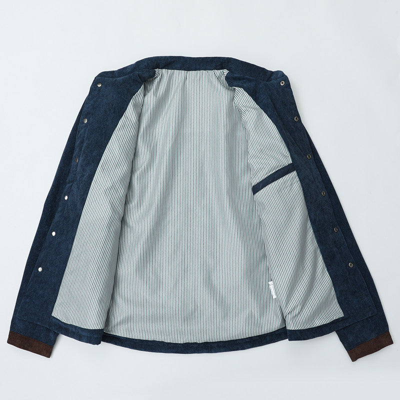Herren Steppjacke im Cord-Mix mit Kontrast-Schulterpartie und verdeckter Druckknopfleiste Drune
