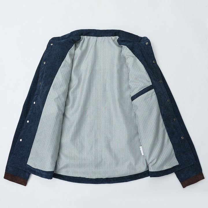 Herren Steppjacke im Cord-Mix mit Kontrast-Schulterpartie und verdeckter Druckknopfleiste Drune