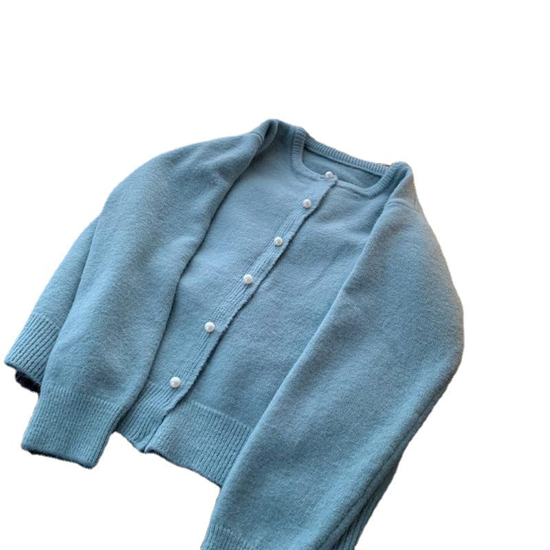 Damen Strickjacke mit edlen Perlenknöpfen und modernem Design Drune