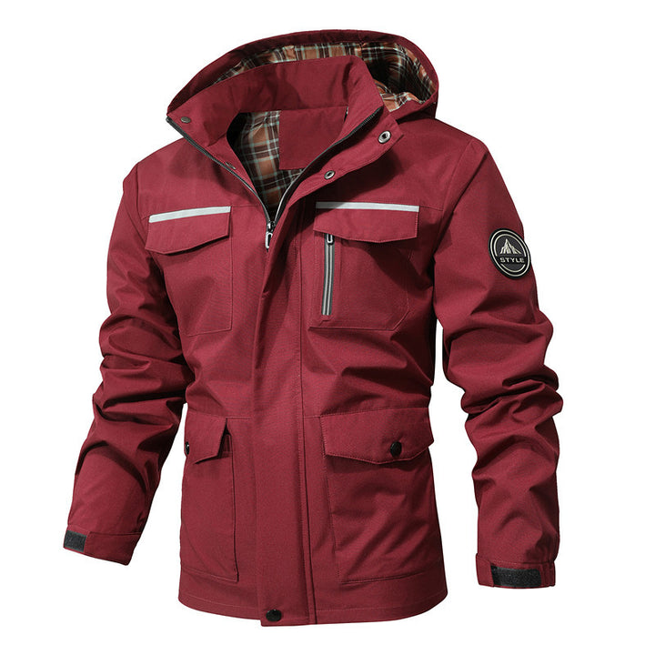 Herren Outdoor-Fieldparka mit wasserabweisender Außenhülle kariertem Innenfutter und reflektierenden Details Drune