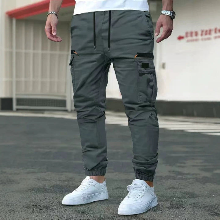 Herren Tapered Cargohose im Joggerstil mit Elastikbund, Tiefer Schritt‑Tasche & Reißverschlusstaschen Drune