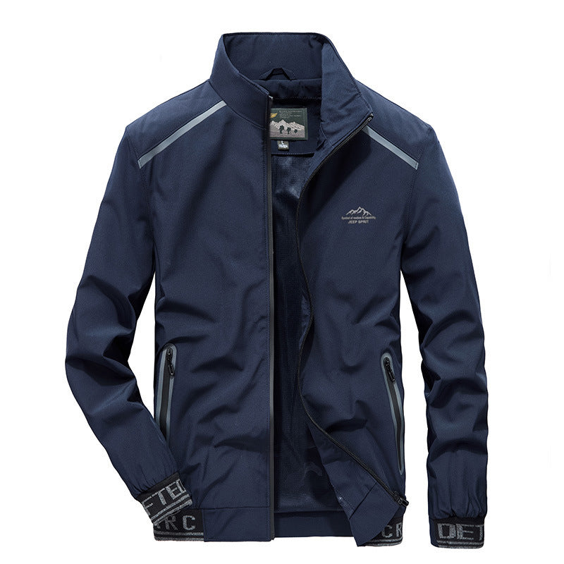 Herren Softshelljacke mit reflektierenden Einsätzen, wasserabweisenden Reißverschlusstaschen und hohem Stehkragen Drune