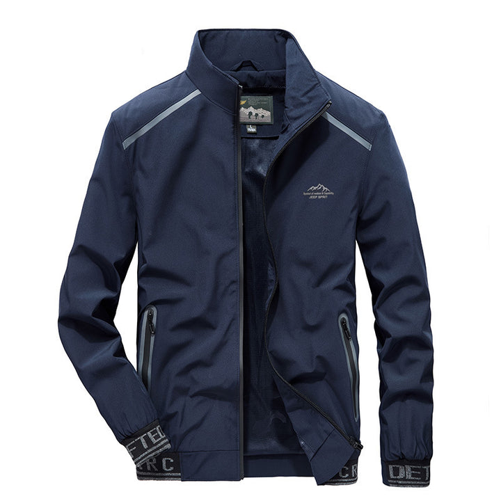 Herren Softshelljacke mit reflektierenden Einsätzen, wasserabweisenden Reißverschlusstaschen und hohem Stehkragen Drune