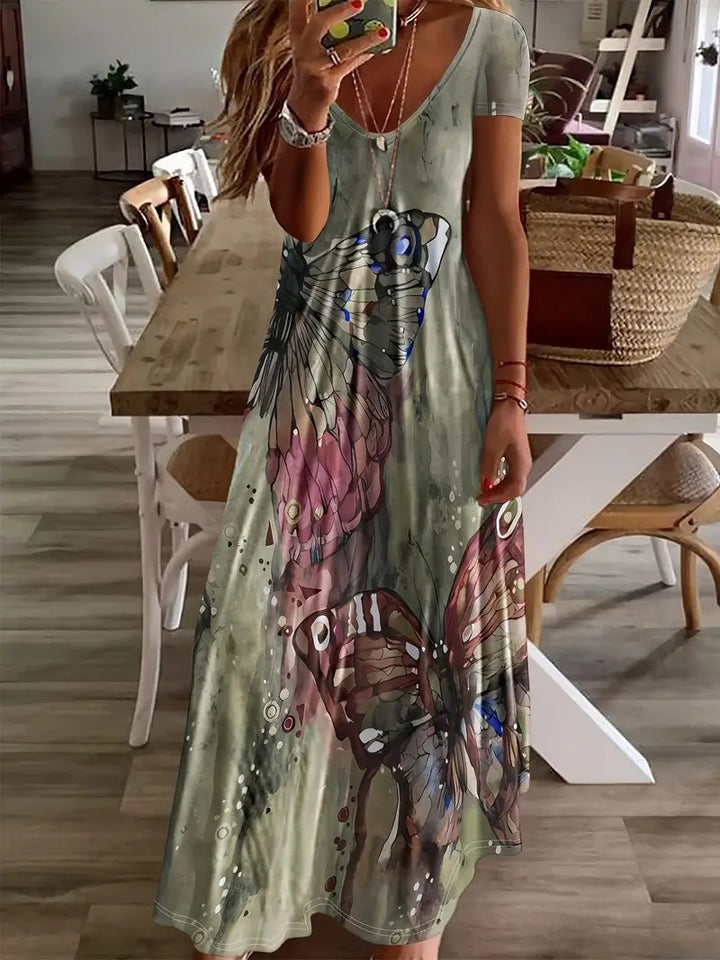 Damen Maxikleid mit floralen Schmetterlingsmotiven und weich fließendem Stoff Drune