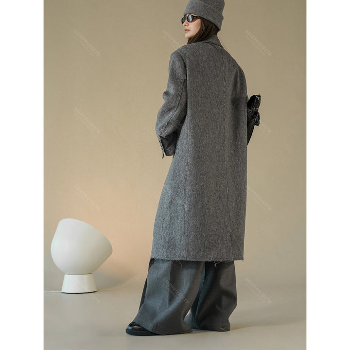 Damen Boxy Langmantel aus Wollmix mit ausgefransten Kanten und Doppelreiher Drune