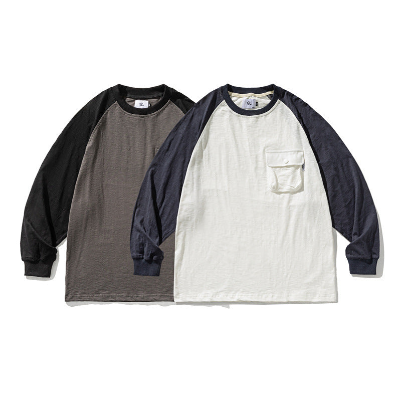 Unisex Lässiges Raglan-Longsleeve mit Kontrastärmeln und aufgesetzter Klappentasche Drune