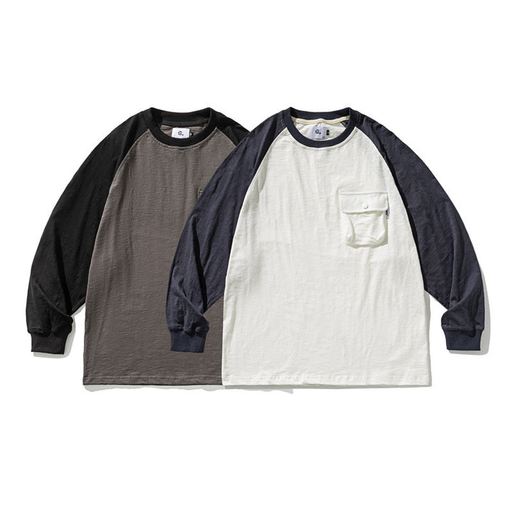 Unisex Lässiges Raglan-Longsleeve mit Kontrastärmeln und aufgesetzter Klappentasche Drune