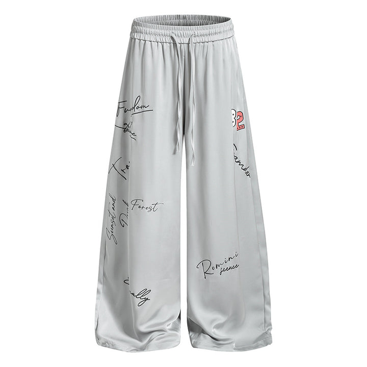 Damen Weite Satin-Palazzo-Loungehose mit Elastikbund, Kordelzug und Script-Print Drune