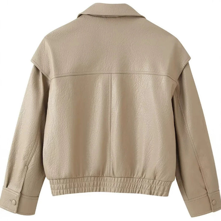 Damen Kurzblouson aus Kunstleder mit zweireihiger Knopfleiste, breitem Revers und gerafftem Bund Drune