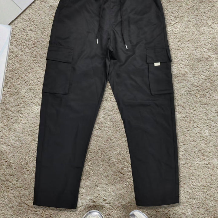 Herren Weite Cargo-Freizeithose aus leichtem Funktionsstoff mit großen Pattentaschen Drune