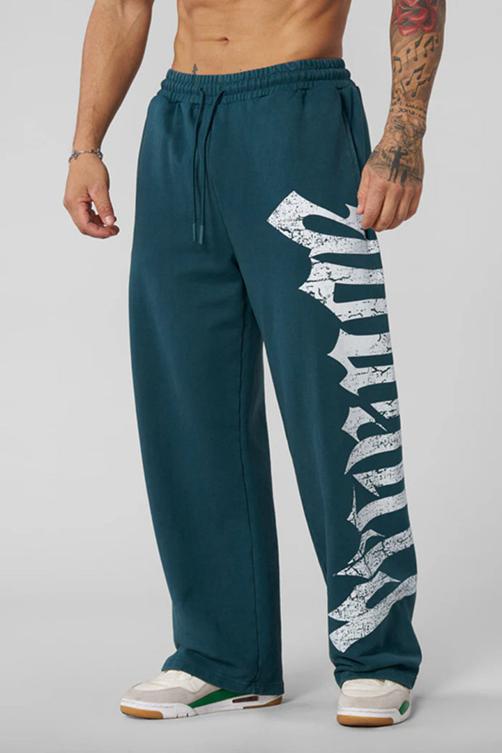 Herren nan weite Sweathose aus angerautem Fleece mit seitlichem Vintage-Print und Kordelbund Drune