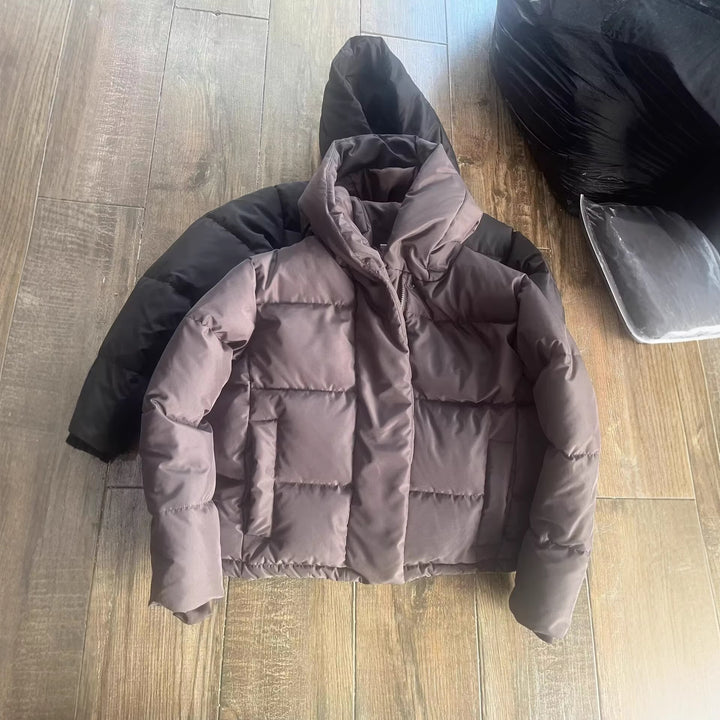 Damen Kurz geschnittene gesteppte Pufferjacke mit hohem Stehkragen und verdeckter Druckknopfleiste Drune