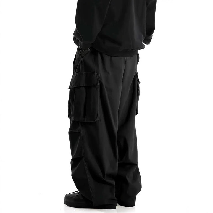 Herren Weite Baggy-Cargohose mit tiefem Schritt, großen Klappentaschen & relaxed Fit Drune