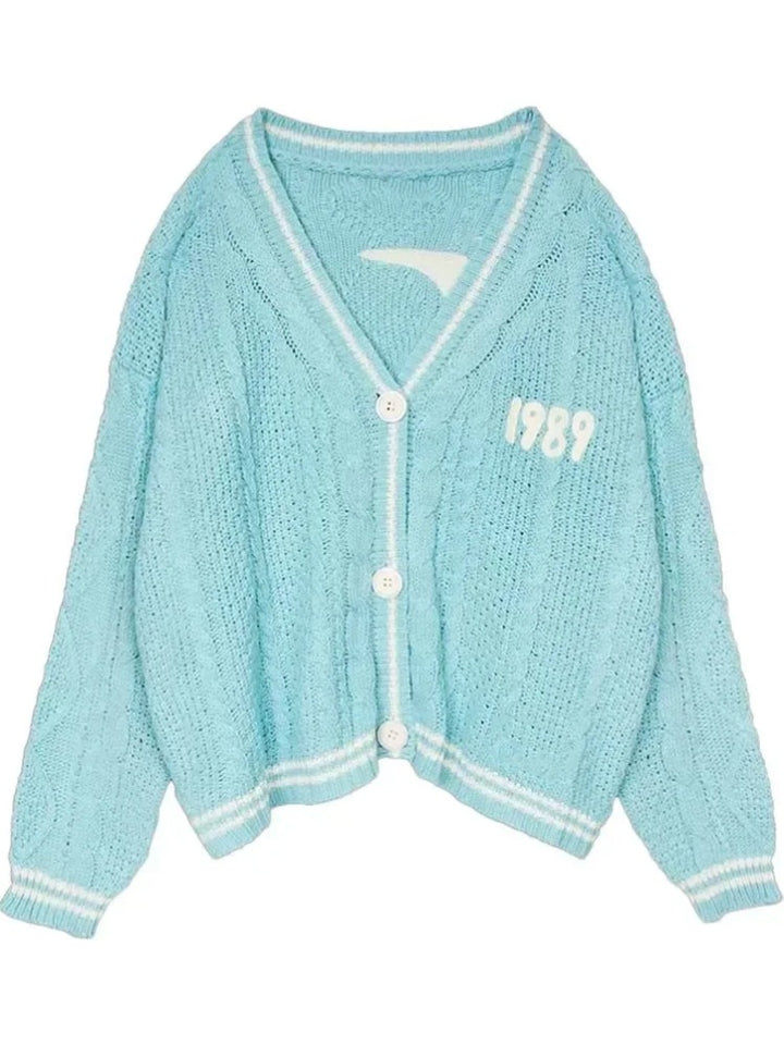 Damen nan kurz geschnittene Strickjacke mit V-Ausschnitt, Kontrastpaspel und oversized Ärmeln Drune