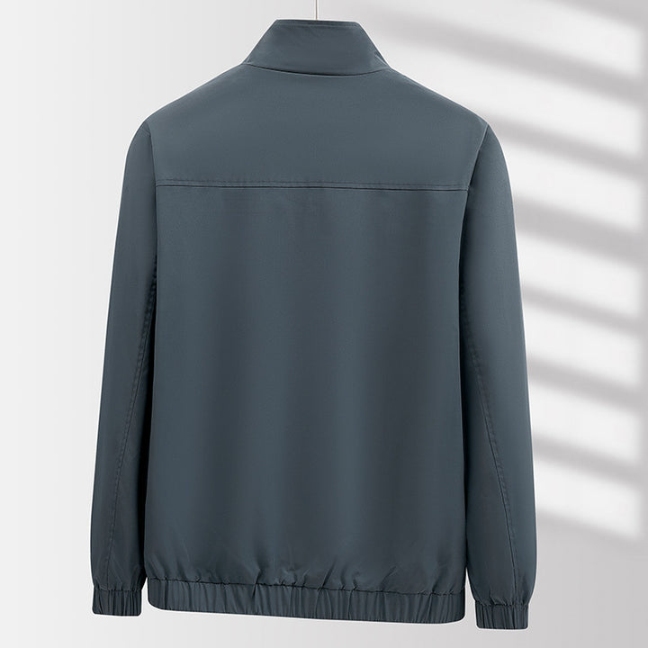 Herren Leichte atmungsaktive Windjacke mit Stehkragen, Reißverschlusstaschen und Kordelzug Saum Drune