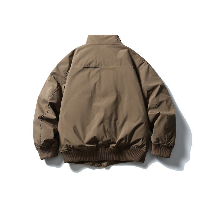 Unisex Kastig geschnittene wattierte Bomberjacke mit hohem Stehkragen und verdeckter Frontblende Drune