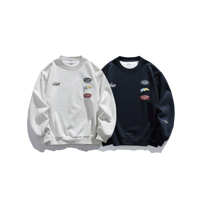 Unisex Oversize-Pullover mit Rundhalsausschnitt, Badge-Applikationen und gerippten Bündchen Drune