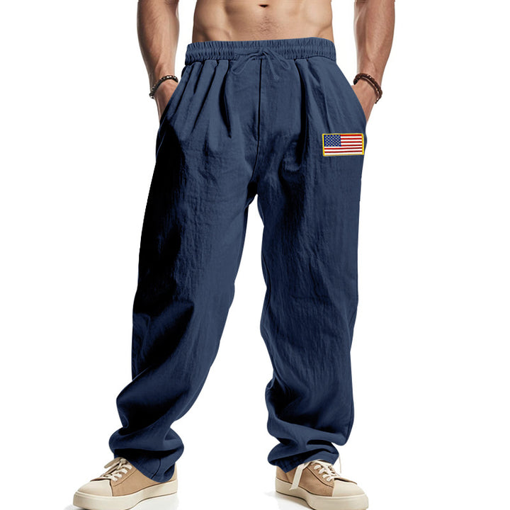 Herren Locker sitzende Freizeit-Hose im Leinen-Look mit elastischem Bund, Kordelzug & Flaggenpatch Drune