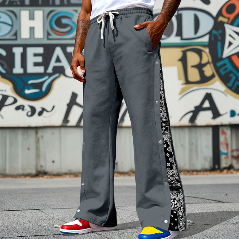 Herren Weite Snap-Trackhose mit Tunnelzug, seitlicher Bandana-Blende und Druckknopfleiste Drune