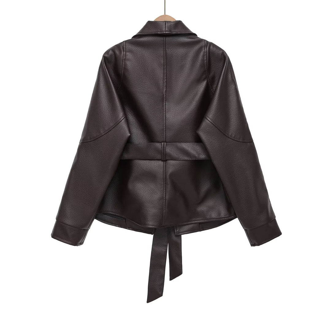 Damen nan kastiger Kunstlederjacke mit Schalkragen, Taillengürtel und genarbter Oberfläche Drune