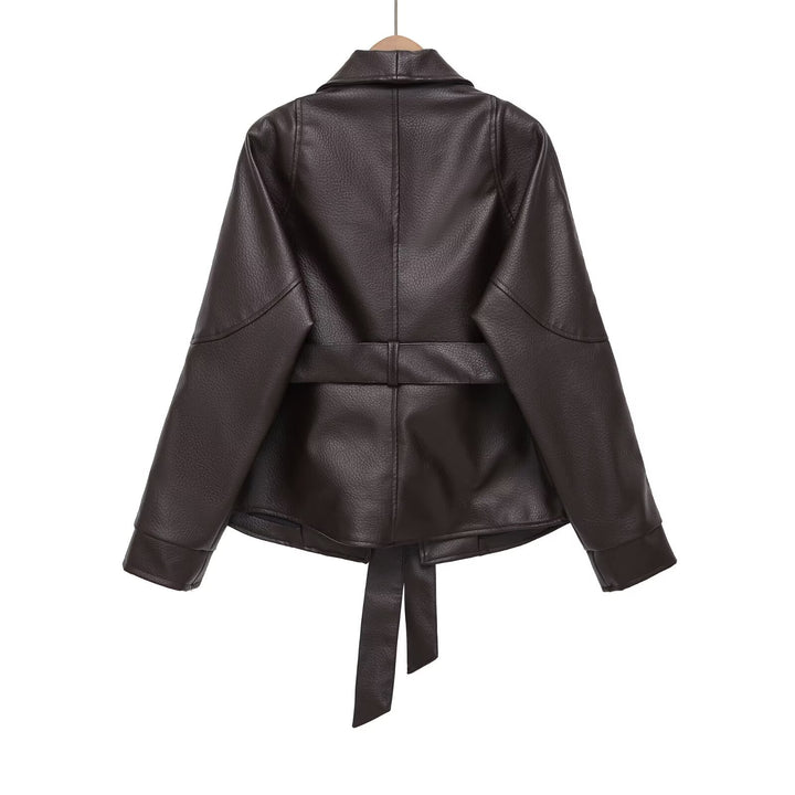 Damen nan kastiger Kunstlederjacke mit Schalkragen, Taillengürtel und genarbter Oberfläche Drune
