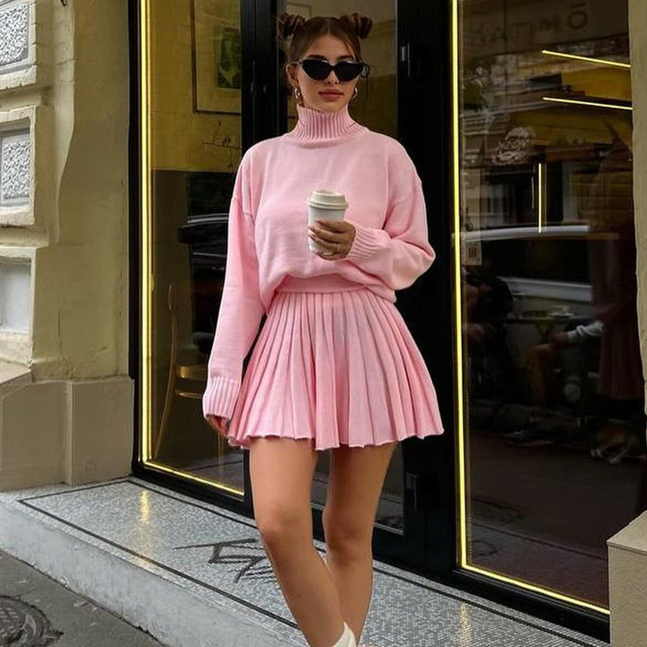 Damen Strickpullover mit hohem Kragen und plissierter Minirock Drune