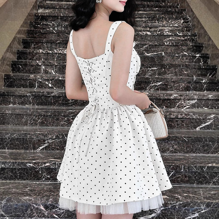 Damen Sommerliches Kleid mit schwingendem Rock und Punktmuster Drune