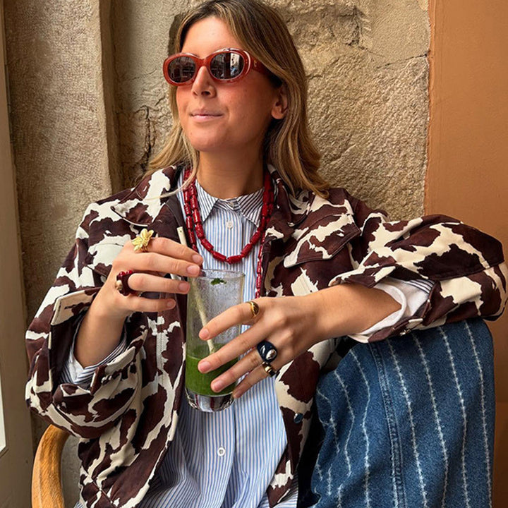 Damen Kunstlederjacke im modernen Cow-Print Design Drune
