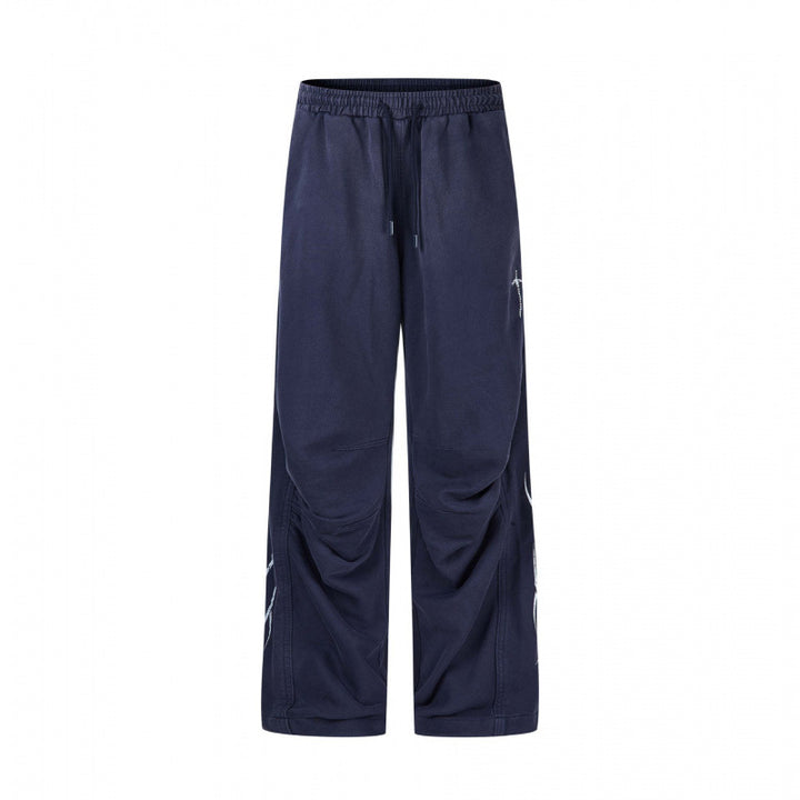 Herren weite Sweatpants im Baggy‑Cut mit Elastikbund, Kordelzug und geraffter Kniepartie Drune