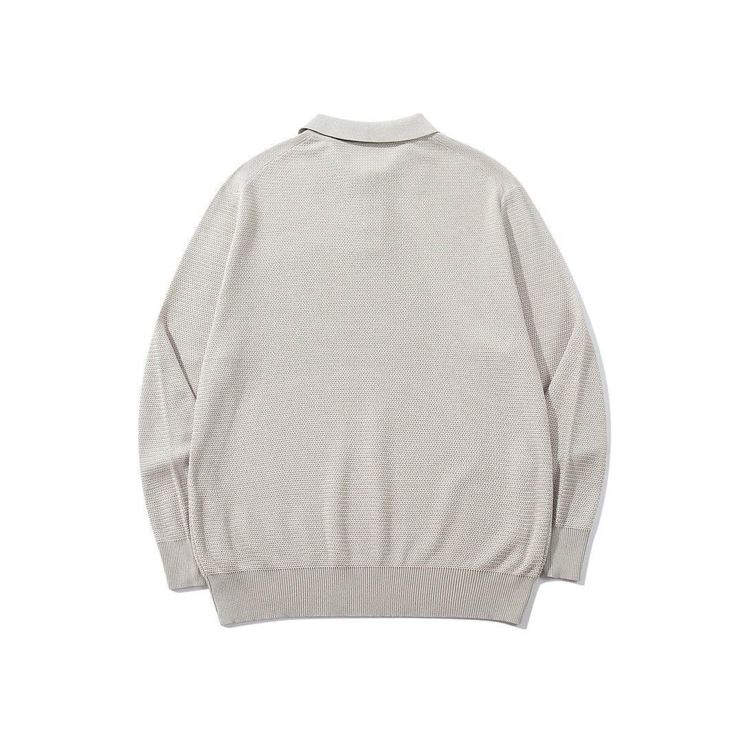 Unisex Waffelstrick-Polo im Relaxed-Fit mit dreifacher Knopfleiste und geripptem Saum Drune