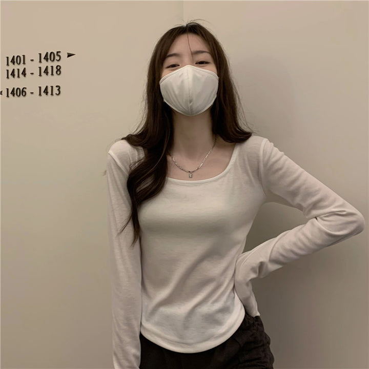 Damen Langarmshirt mit schickem Rundhalsausschnitt und figurbetontem Schnitt
