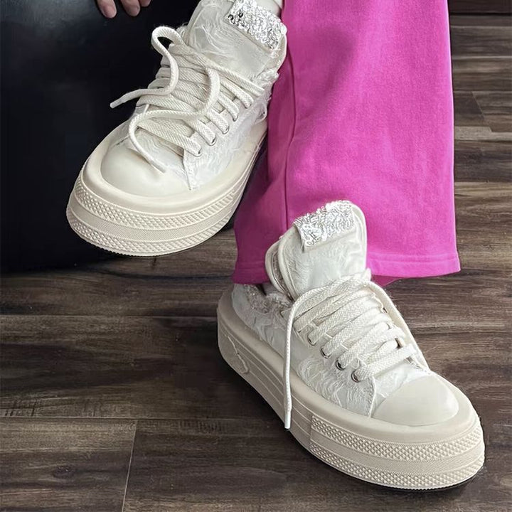 Damen Sneakers mit glitzernden Applikationen und hochgezogenem Plateau Drune