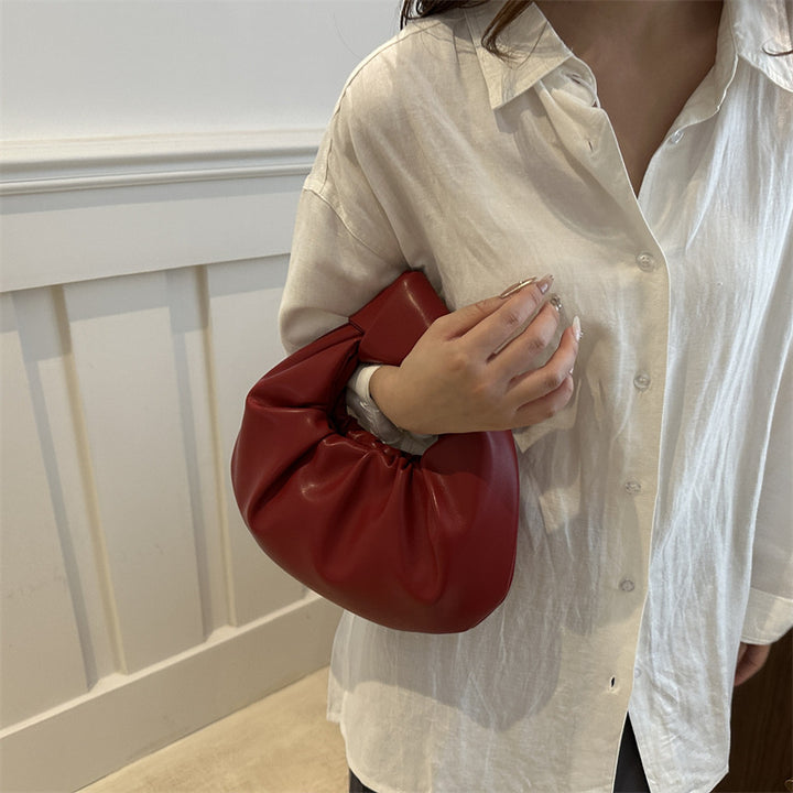 Damen Designer-Handtasche mit innovativem Falt-Design und weicher Silhouette Drune