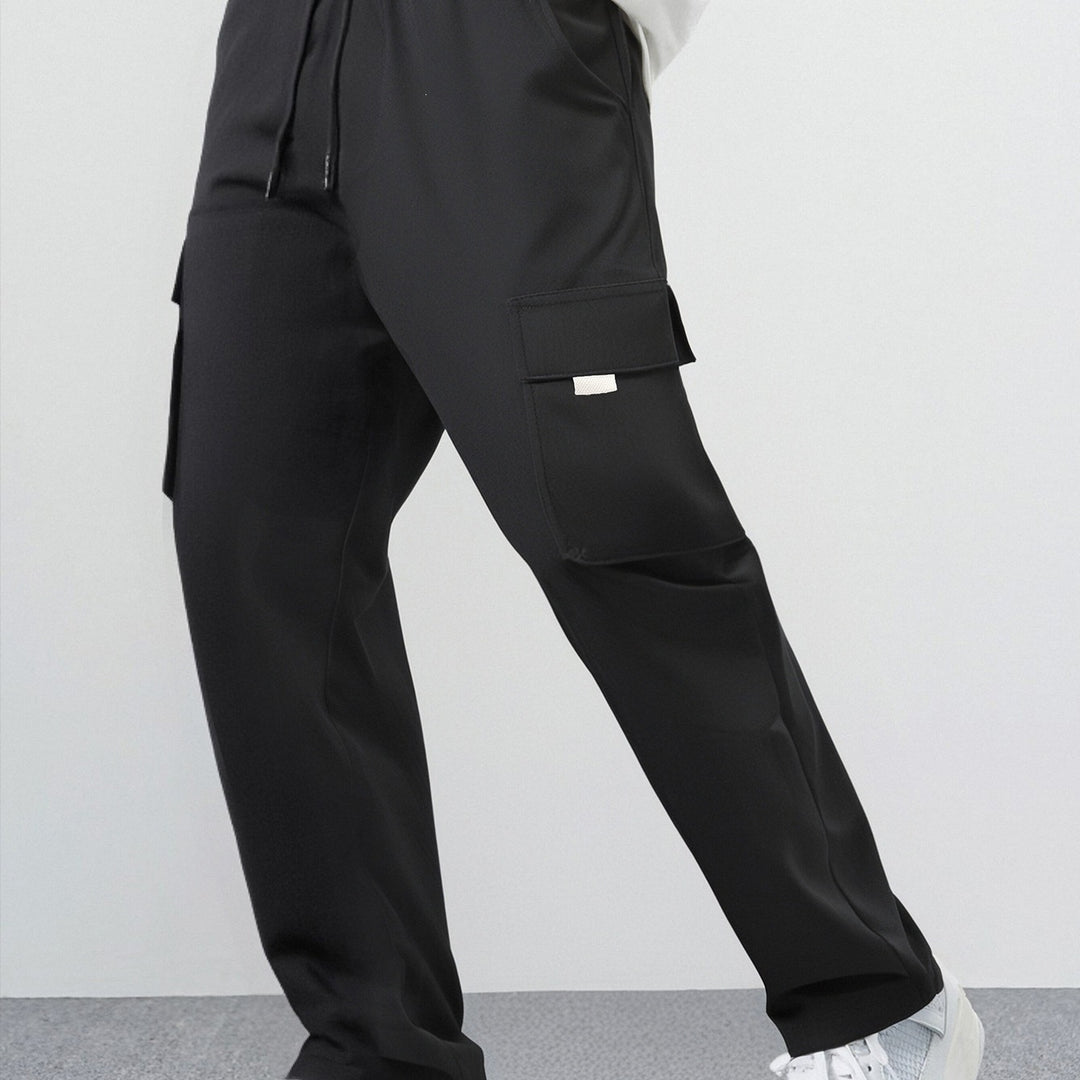 Herren Weite Cargo-Freizeithose aus leichtem Funktionsstoff mit großen Pattentaschen Drune