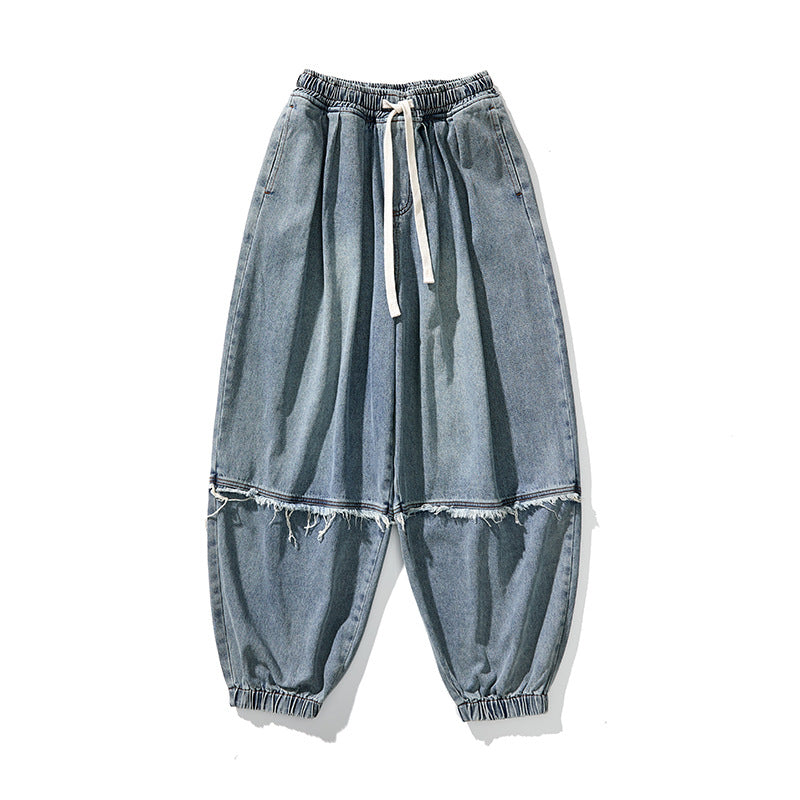 Herren Weit geschnittene Baggy-Denim-Hose mit Tunnelzug, elastischen Beinabschlüssen und Fransen-Detail Drune