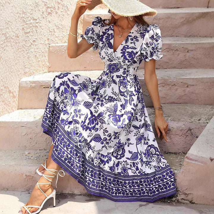 Damen nan tailliertes Boho-Maxikleid mit Wickeloptik V-Ausschnitt Puffärmeln und Bordüren-Stufenrock Drune