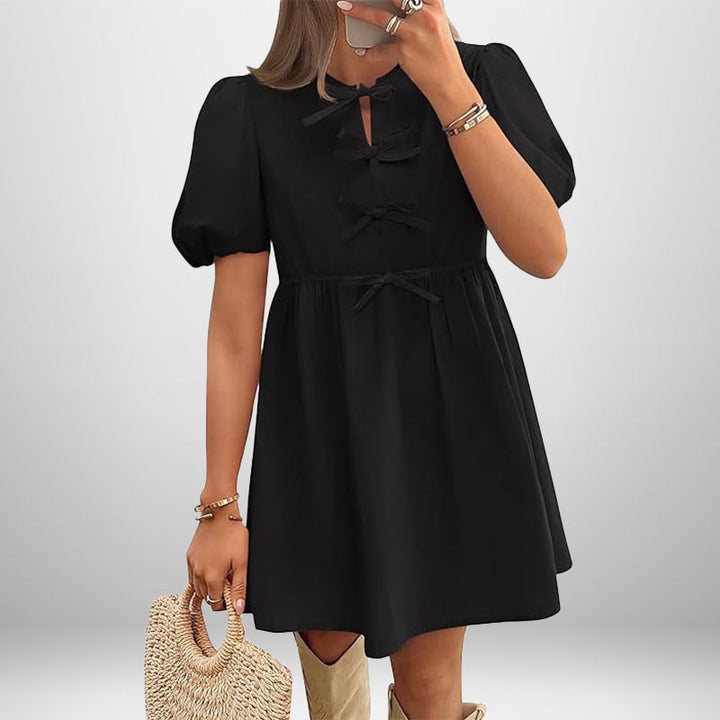 Damen Kurzkleid mit Puffärmeln und liebevollen Schleifendetails Drune