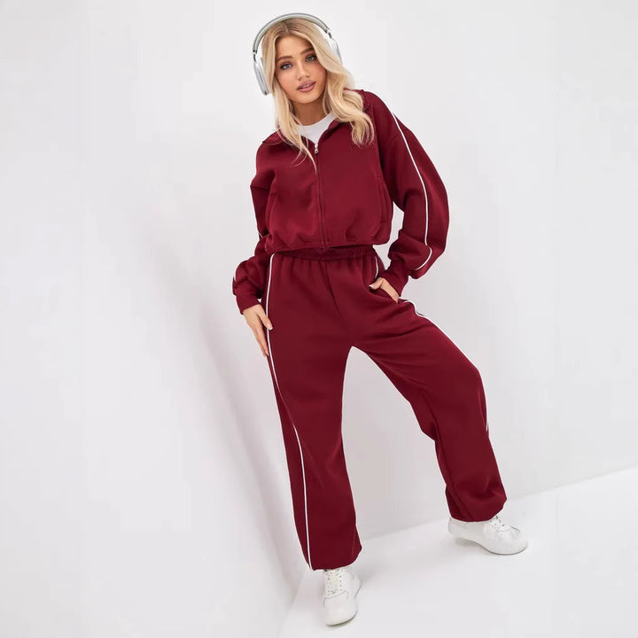 Damen Sportanzug mit hohem Stehkragen und weiten Hosen Drune